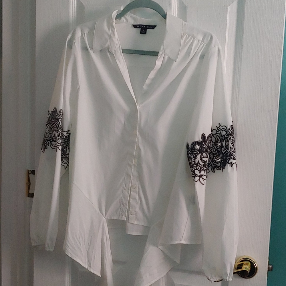 White, button down long sleeve shirt.